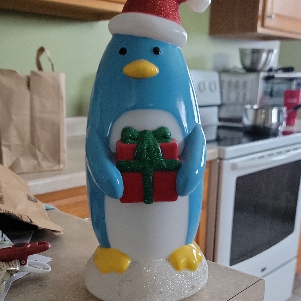 Festive Blue Penguin Figurine with Gift